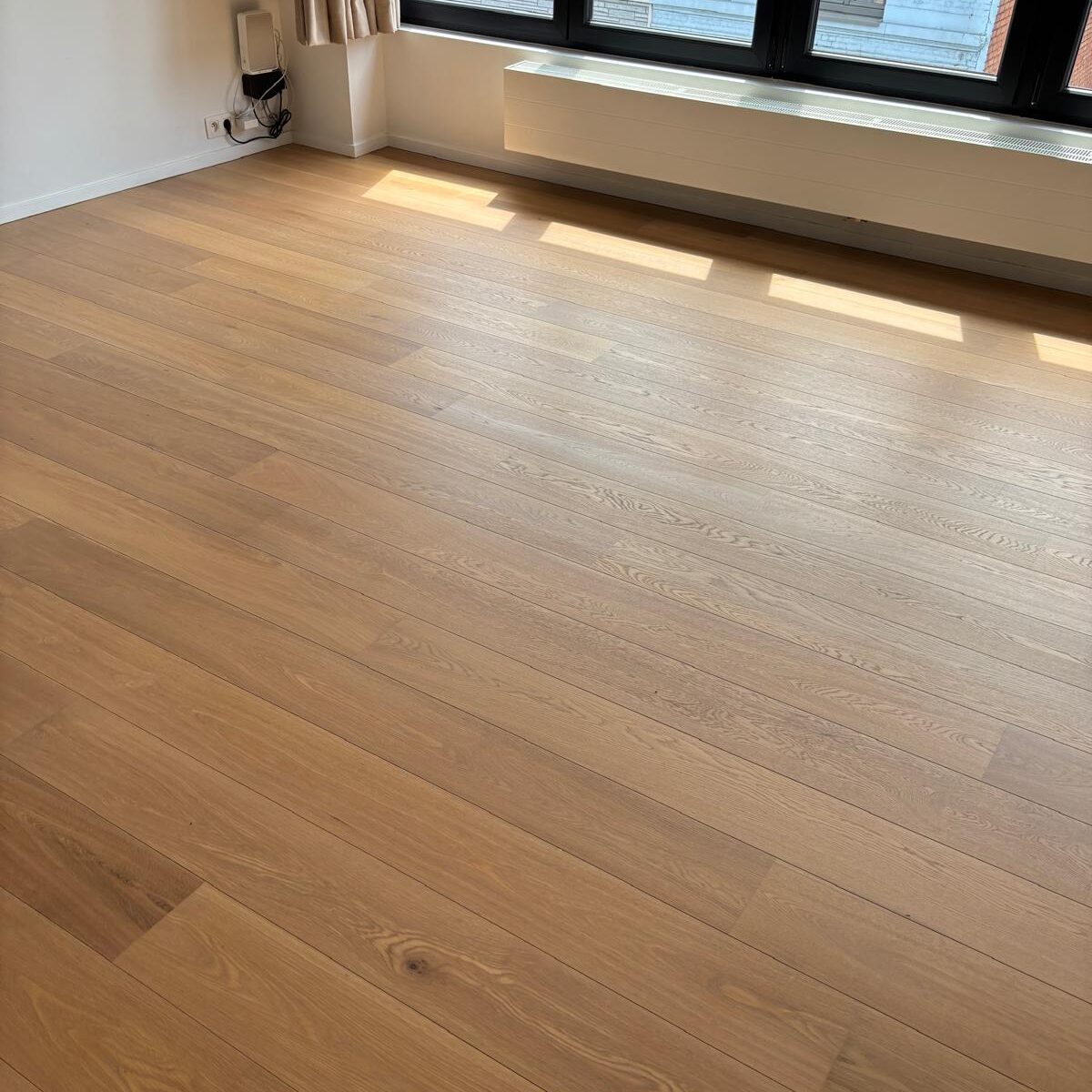 Afbeelding van de parketrenovatie van Sara De Baerdemaeker